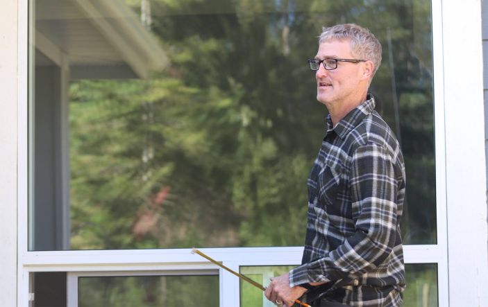 Rick smiling for camera working on home Energy View